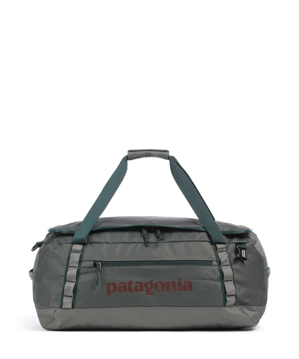 patagonia narwhal grey and orange black hole 70L Duffel - Pollinator closing mesh pockets on the underside for easily misplaced items like your headlamp and phone charger Black Hole Duffel 55L -