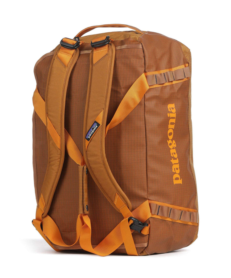 patagonia narwhal grey and orange black hole Duffel 40L closing mesh pockets on the underside for easily misplaced items like your headlamp and phone charger Patagonia Black Hole Duffel 55L