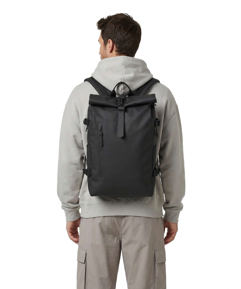 rains oversize backpack Rolltop Rucksack Large offering a generous 23.3 liters of storage capacity Rains Large Book Daypack Backpack